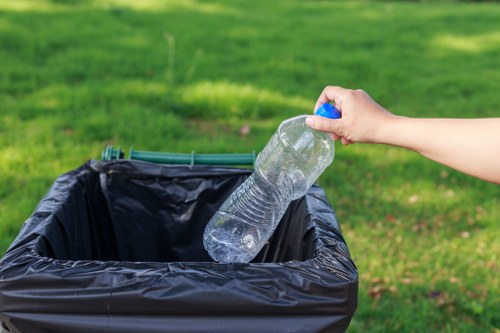 Professional waste removal team handling office waste